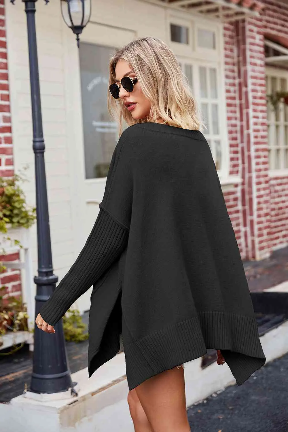 Tess V-Neck Slit Exposed Seam Sweater