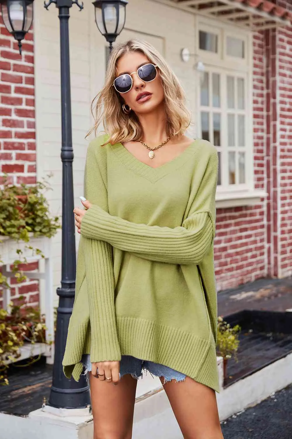 Tess V-Neck Slit Exposed Seam Sweater